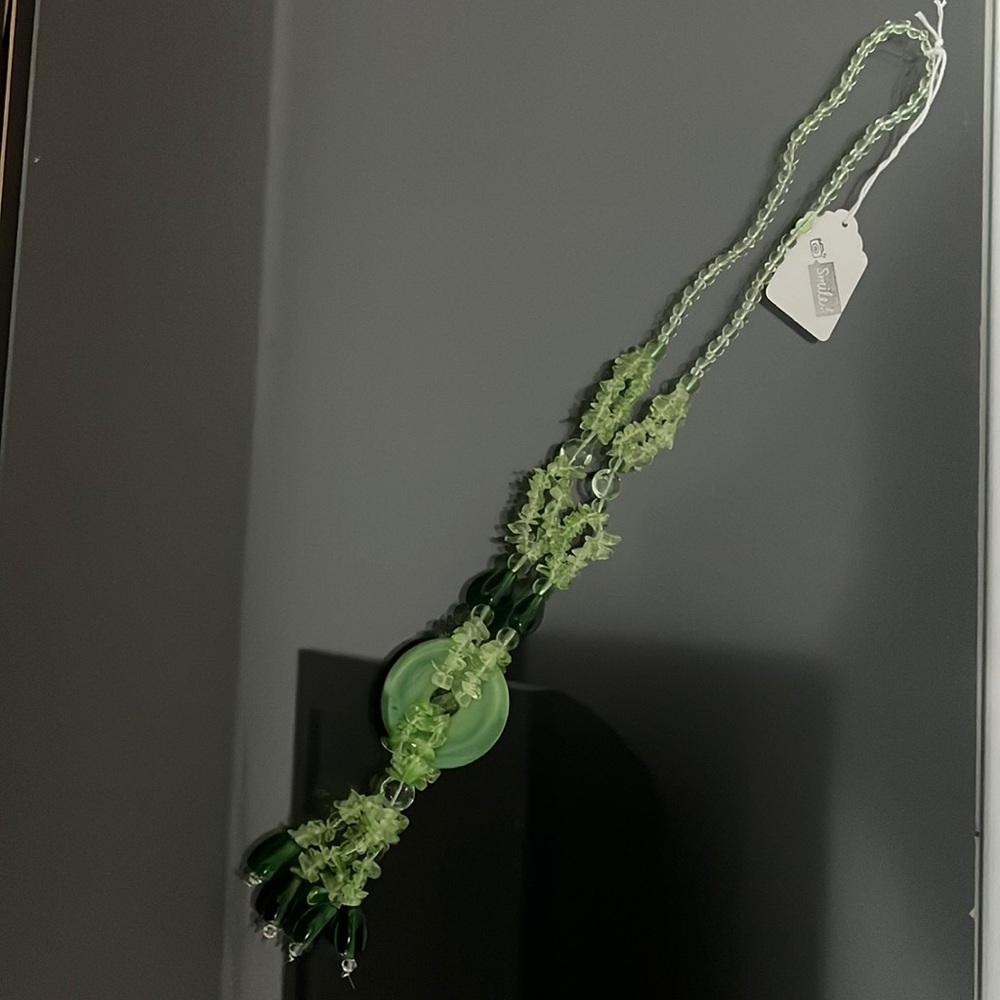 Woman’s Green Necklace.